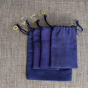 Tory Burch jewelry pouches.  4 are included.